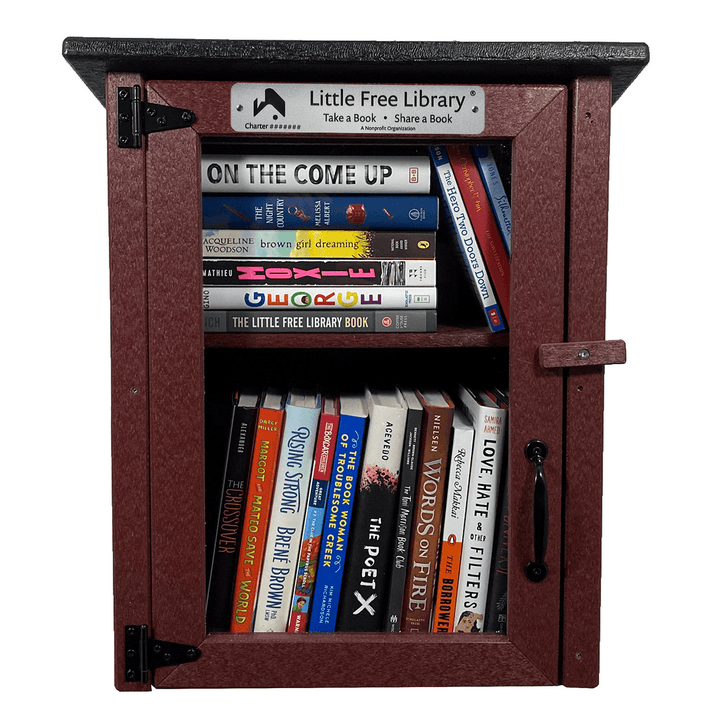 Facade View of a Composite Two Story Maroon Little Free Library with Books and Shelf